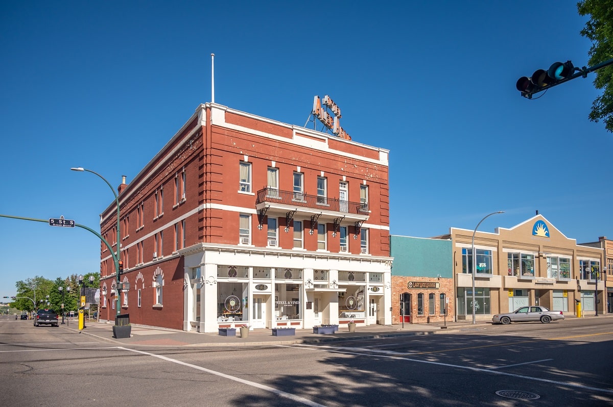 a large historic brick building in downtown Lethbridge