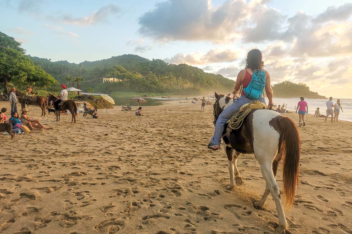 Riding a horse along San Pancho Beach