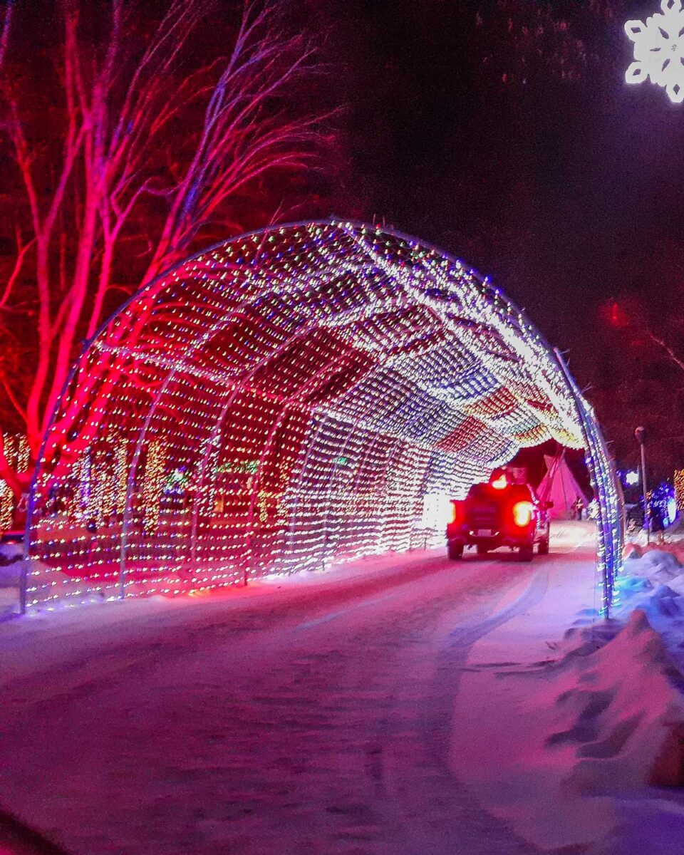 a tunnel of Christmas lights that you drive through at the Magic of Lights event in Edmonton