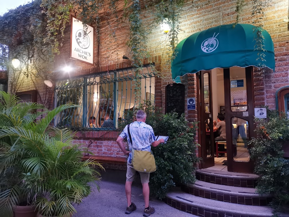the brick building covered in vines that is Archie's Wok