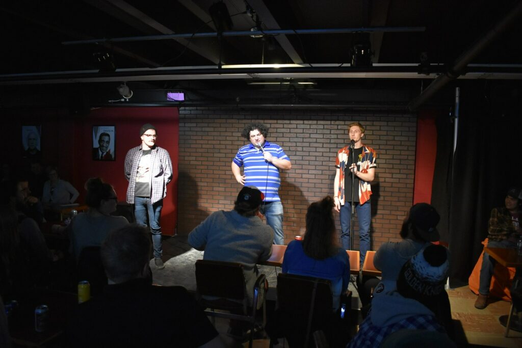 3 people on stage at Good Times Lethbridge Comedy Club