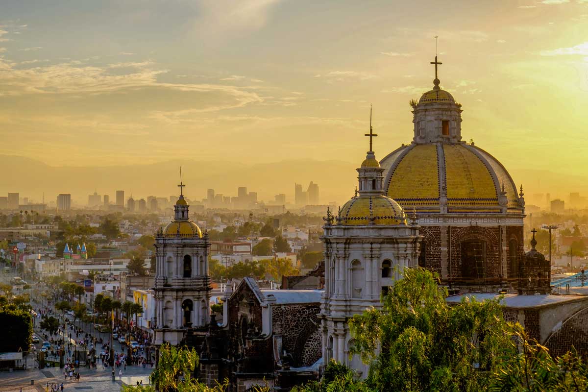 Scenic view at Basilica of Guadalupe with Mexico city skyline Mexico