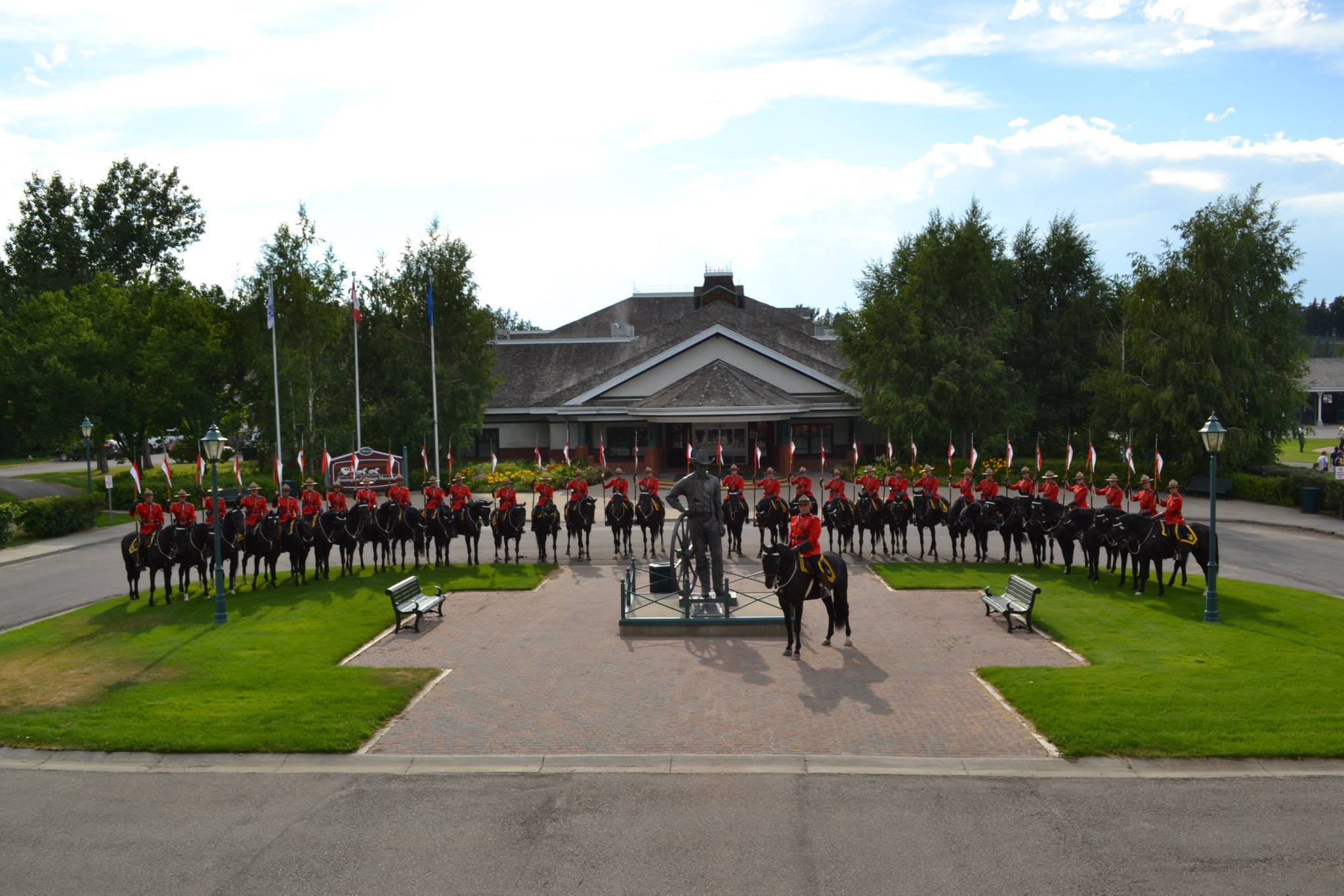 Everyone lined up on their horses getting ready to do the Musical Ride at the Fort Museum of the Northwest Mounted Police in Fort Macleod