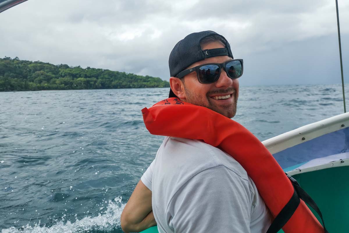 man with life jacket on a marlborough sounds cruise