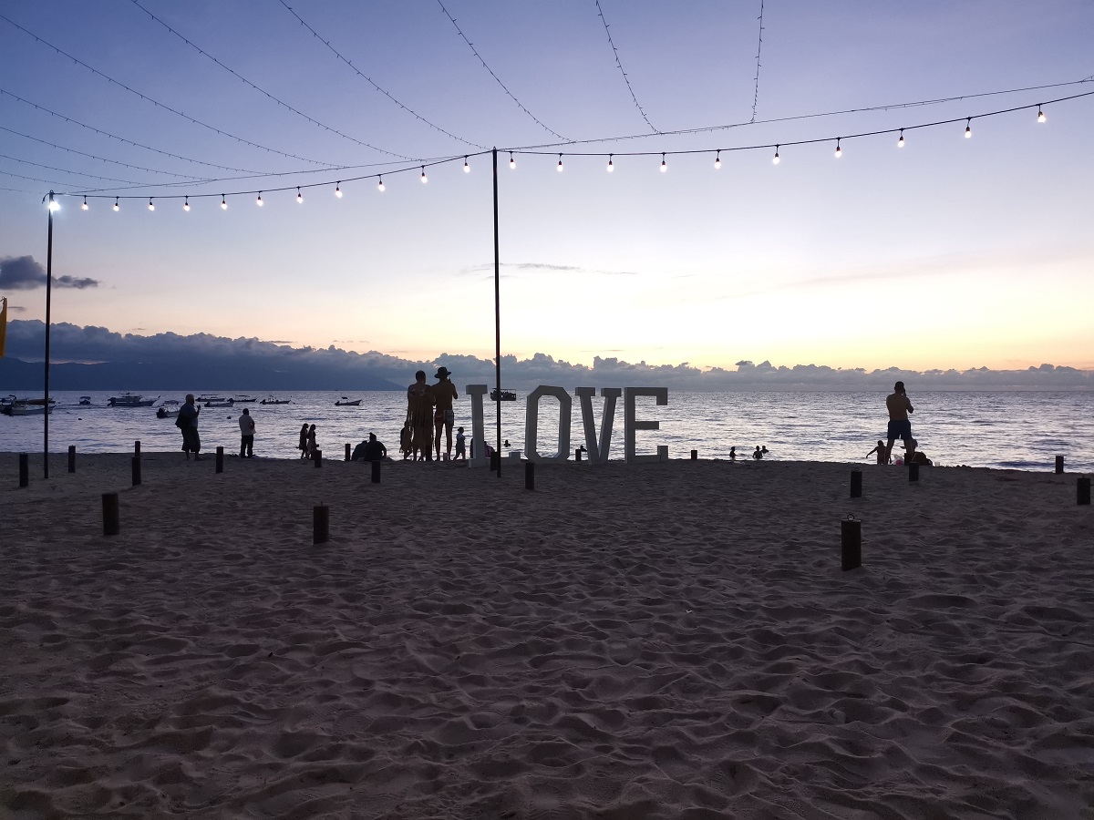 the "LOVE" sign on the beach in Puerto Vallarta