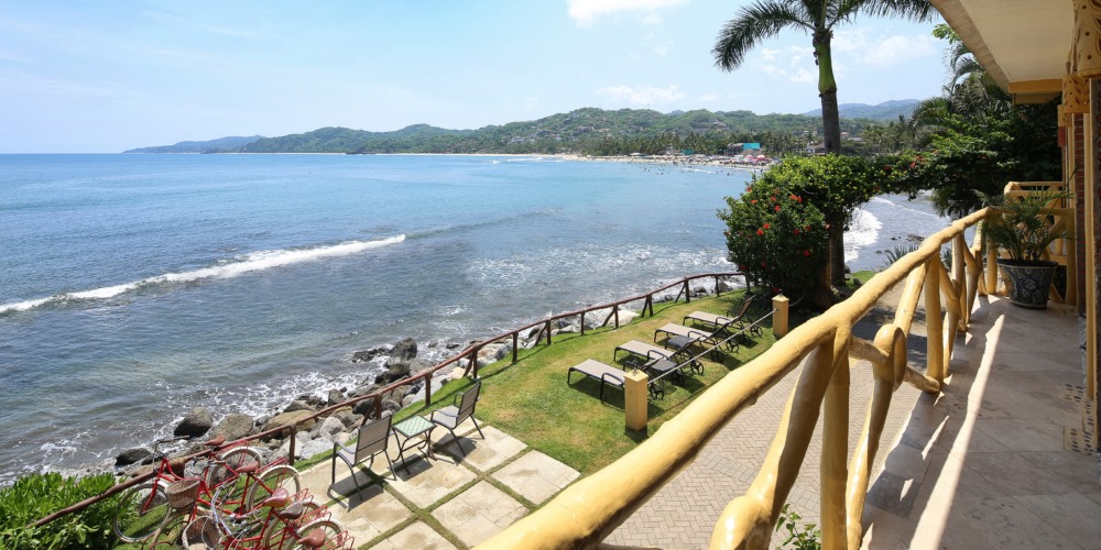 view of the ocean from a room balcony at Villa Amor Sayulita