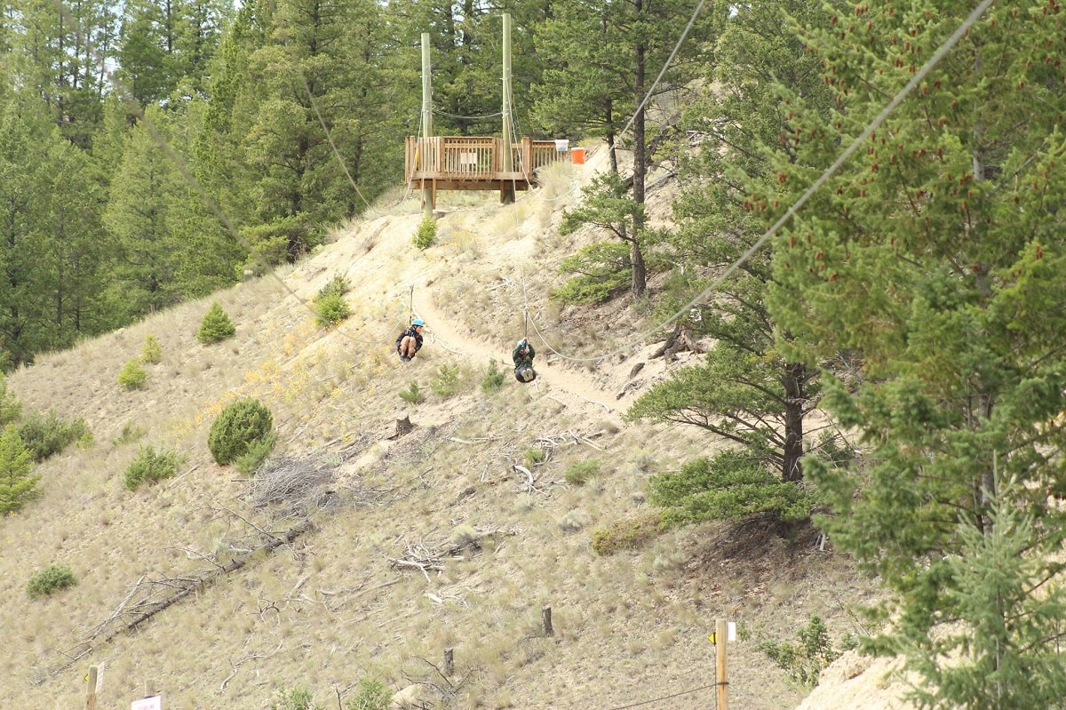 two people zipline in Radium, BC