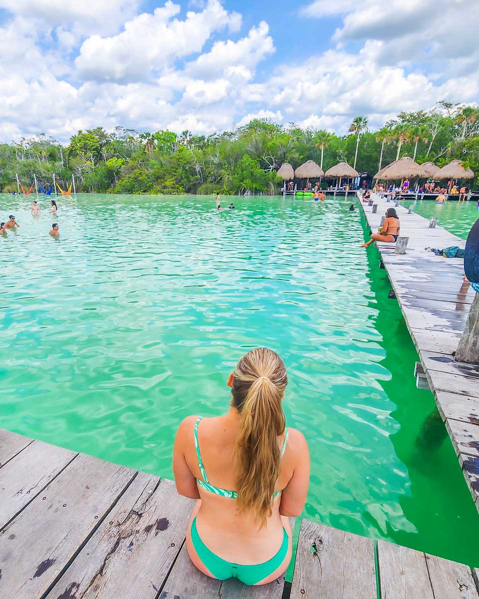 Bailey sits on the dock at Laguna Kaan Luum, Mexico