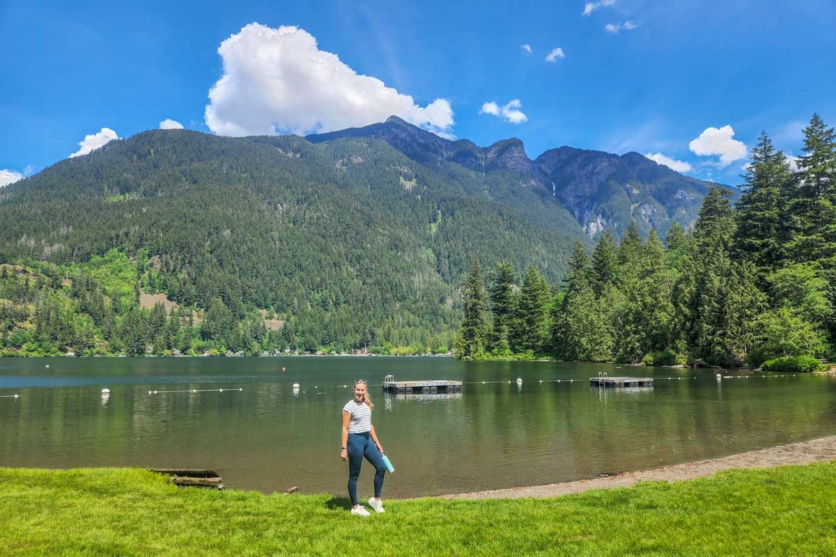 A lady poses for a photo at Kawkawa Lake in Hope, BC