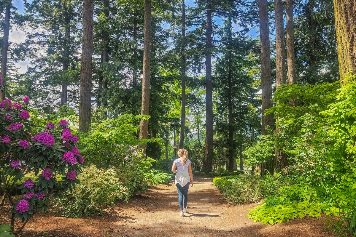 A lady walks through the Japanese Garden in Hope, BC