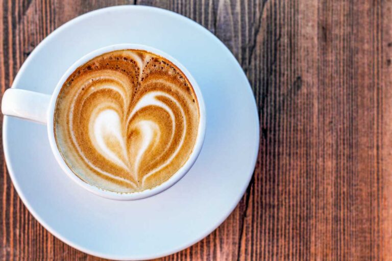 A coffee on a table from a Kelowna Coffee shop