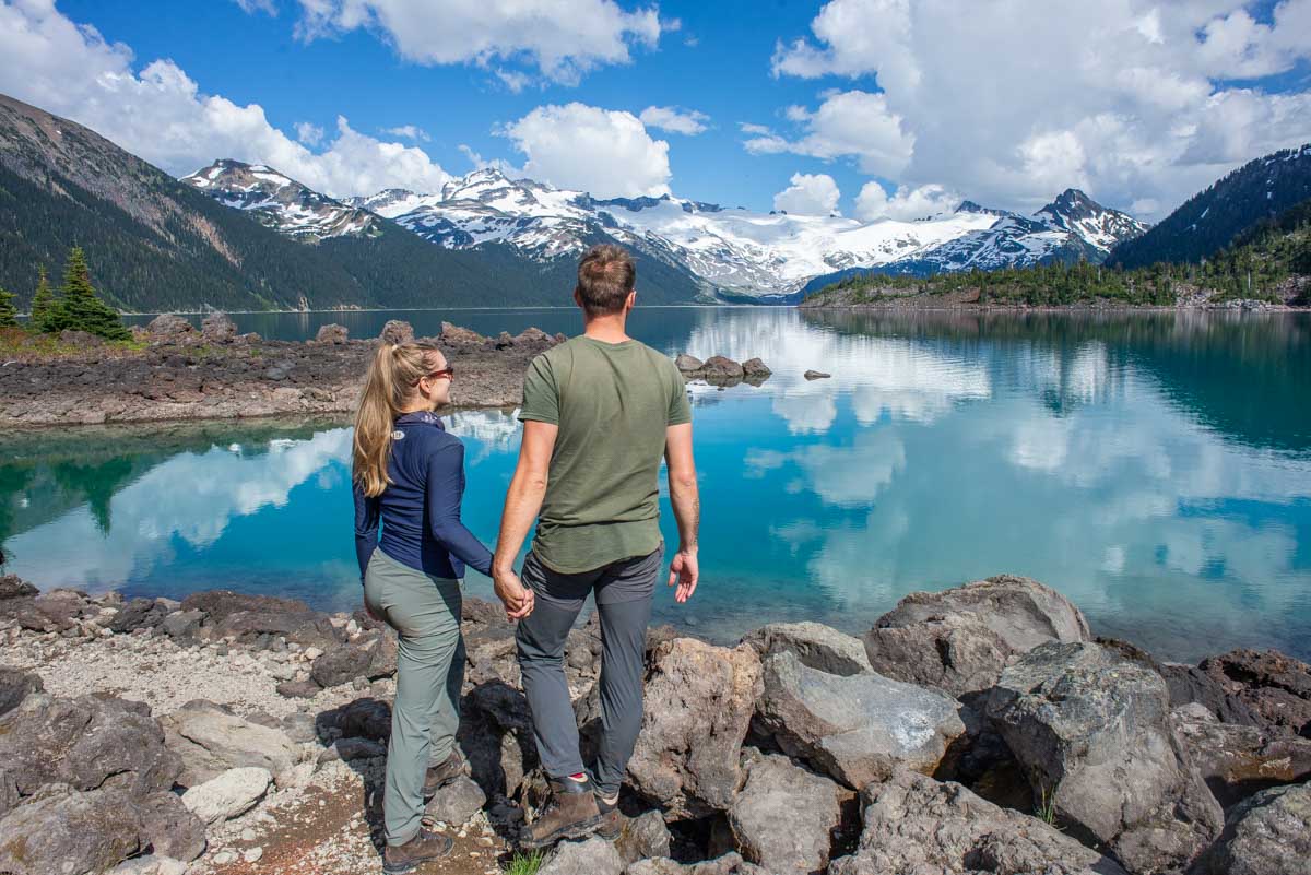 Bailey and Daniel take a photo looking out over Garibaldi Lake, Canada
