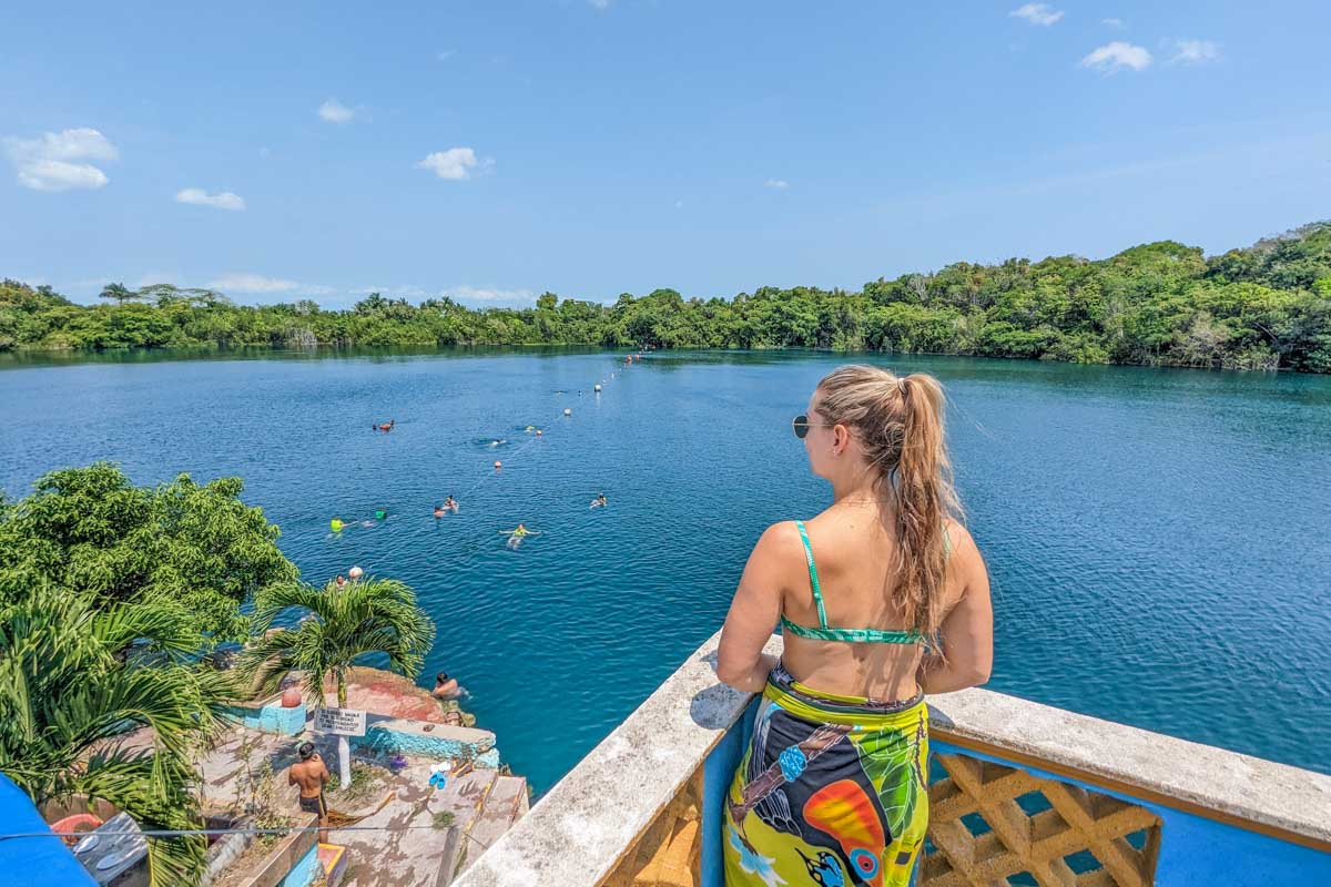 Bailey overlooks Cenote Azul in Bacalar, Mexico