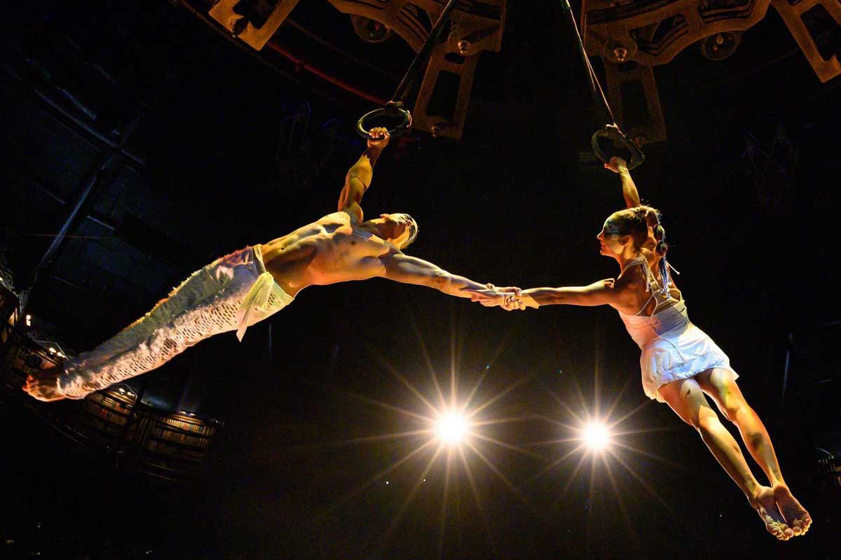Two performers on ropes during a show at Cirque du Soleil JOYÀ in Cancun, Mexico