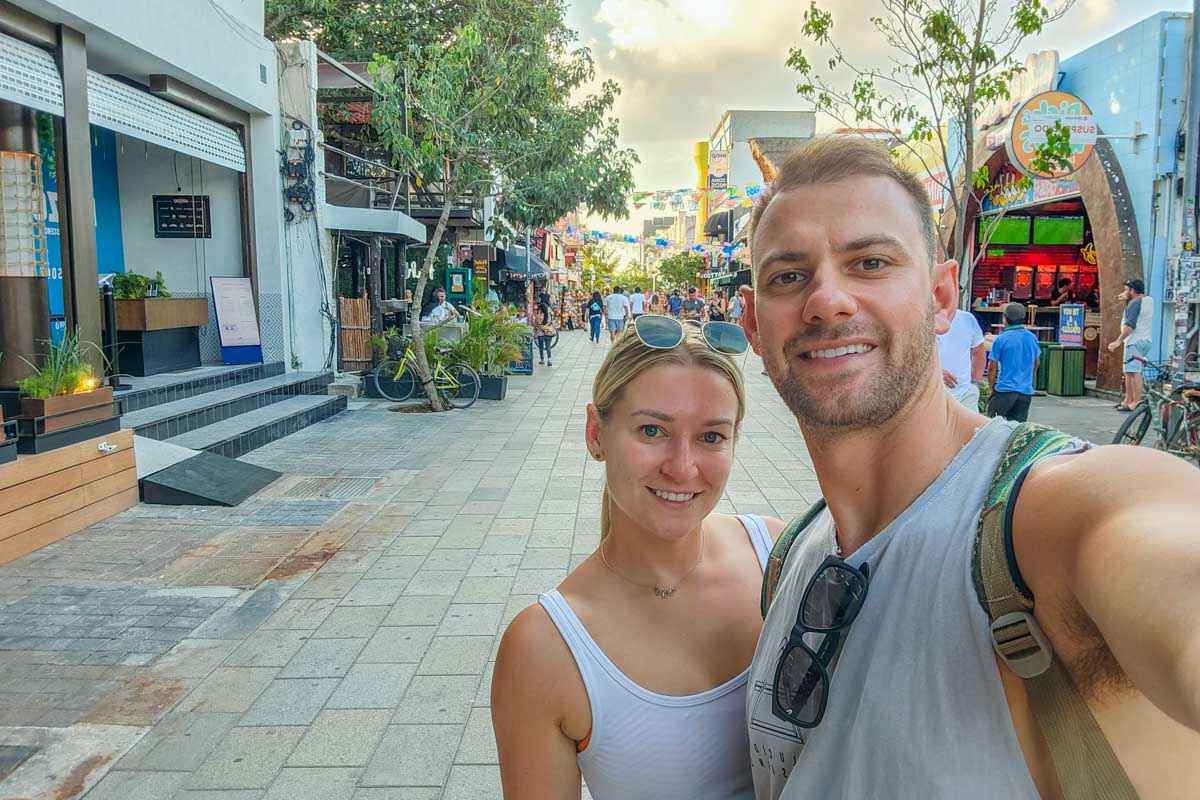 Daniel and Bailey take a photo on 5th Ave in Playa del Carmen, Mexico