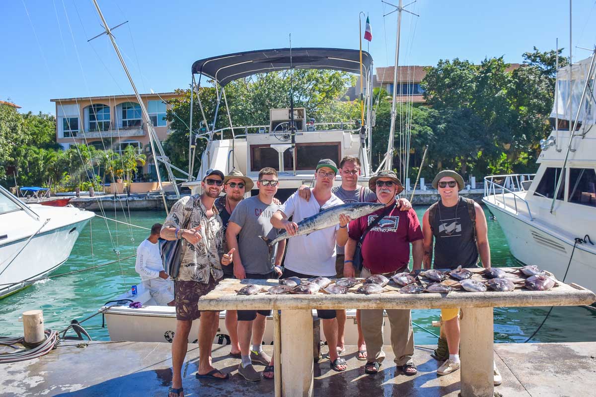 Posing with our catch after fishing in the Yucatan