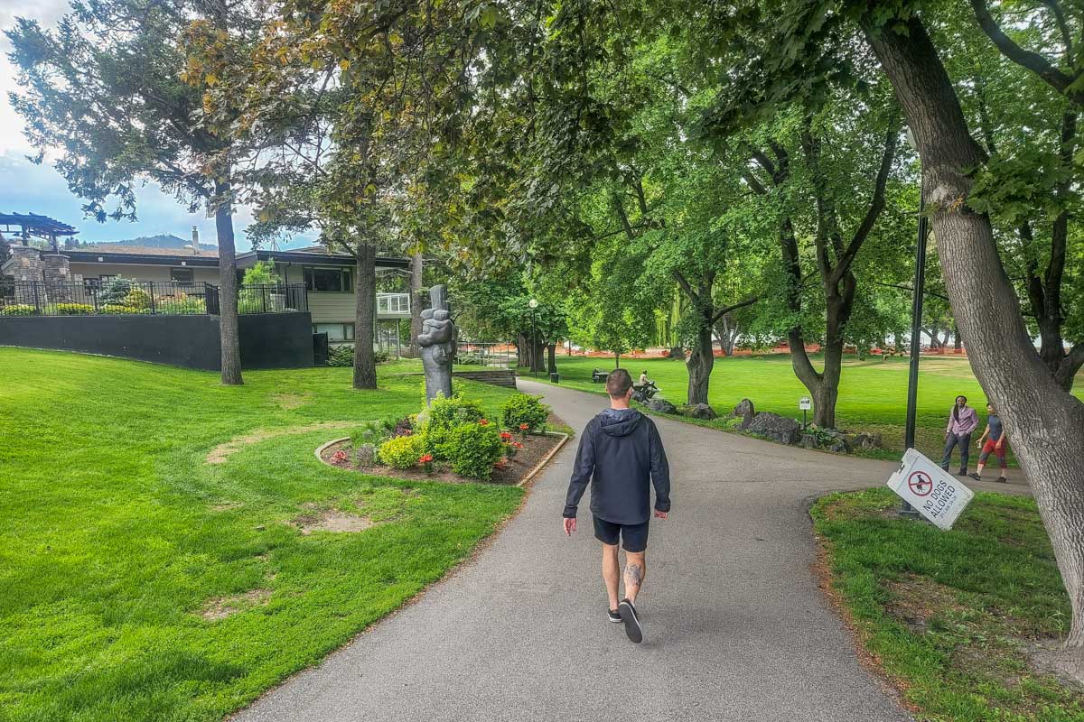A man walks Riverside Park in Kamloops, BC