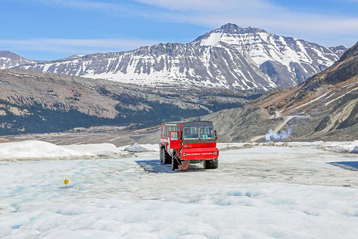 An Ice Explorer all-terrain vehicle parked on the Athabasca Glacier during a tour