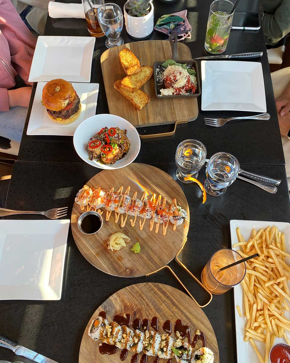 The Phoenix Steakhouse spread of food-2