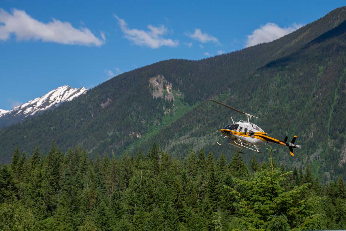 A helicopter takes off in Clearwater, BC