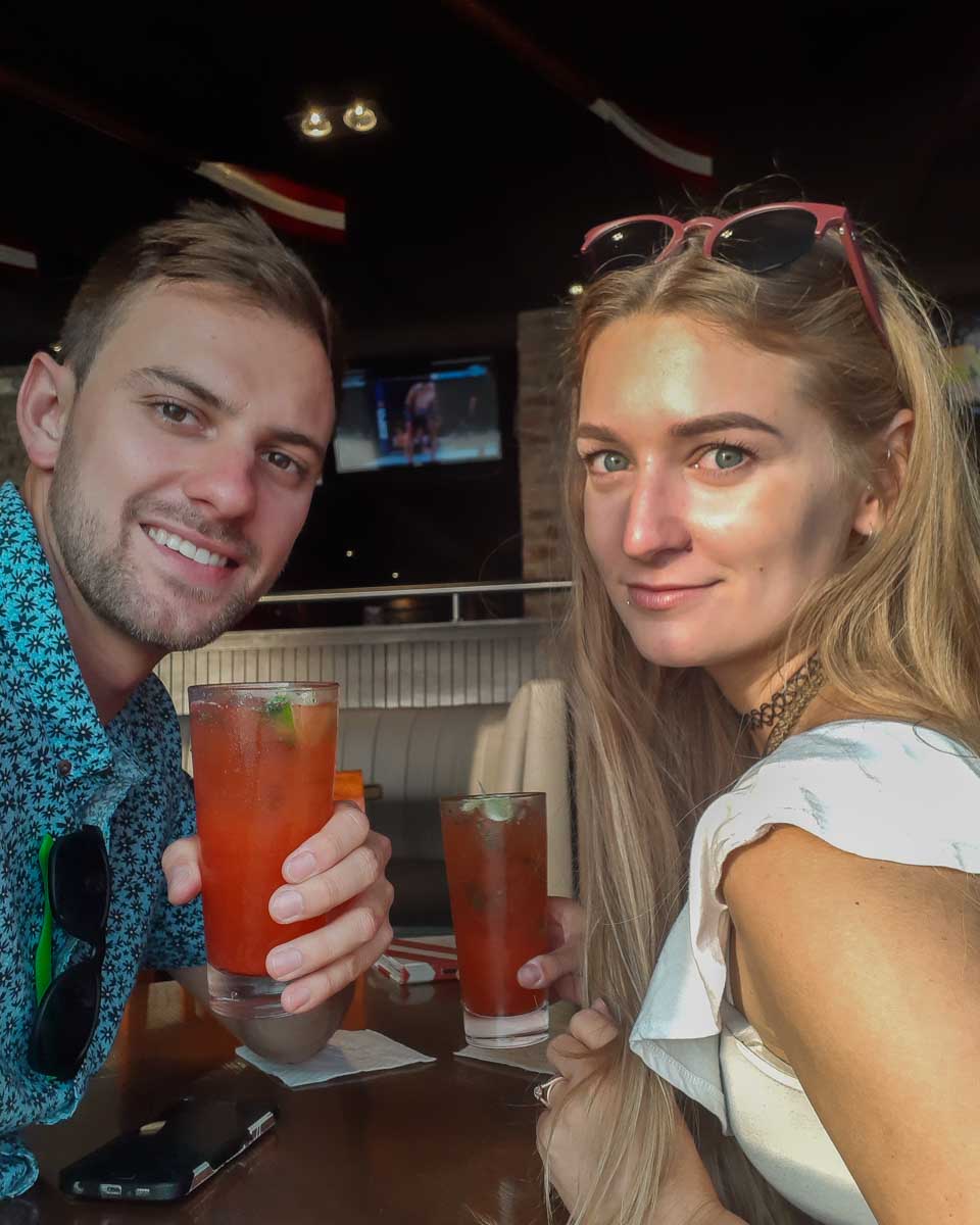 Bailey and Daniel have a drink on Calle Berlin in Lima, Peru