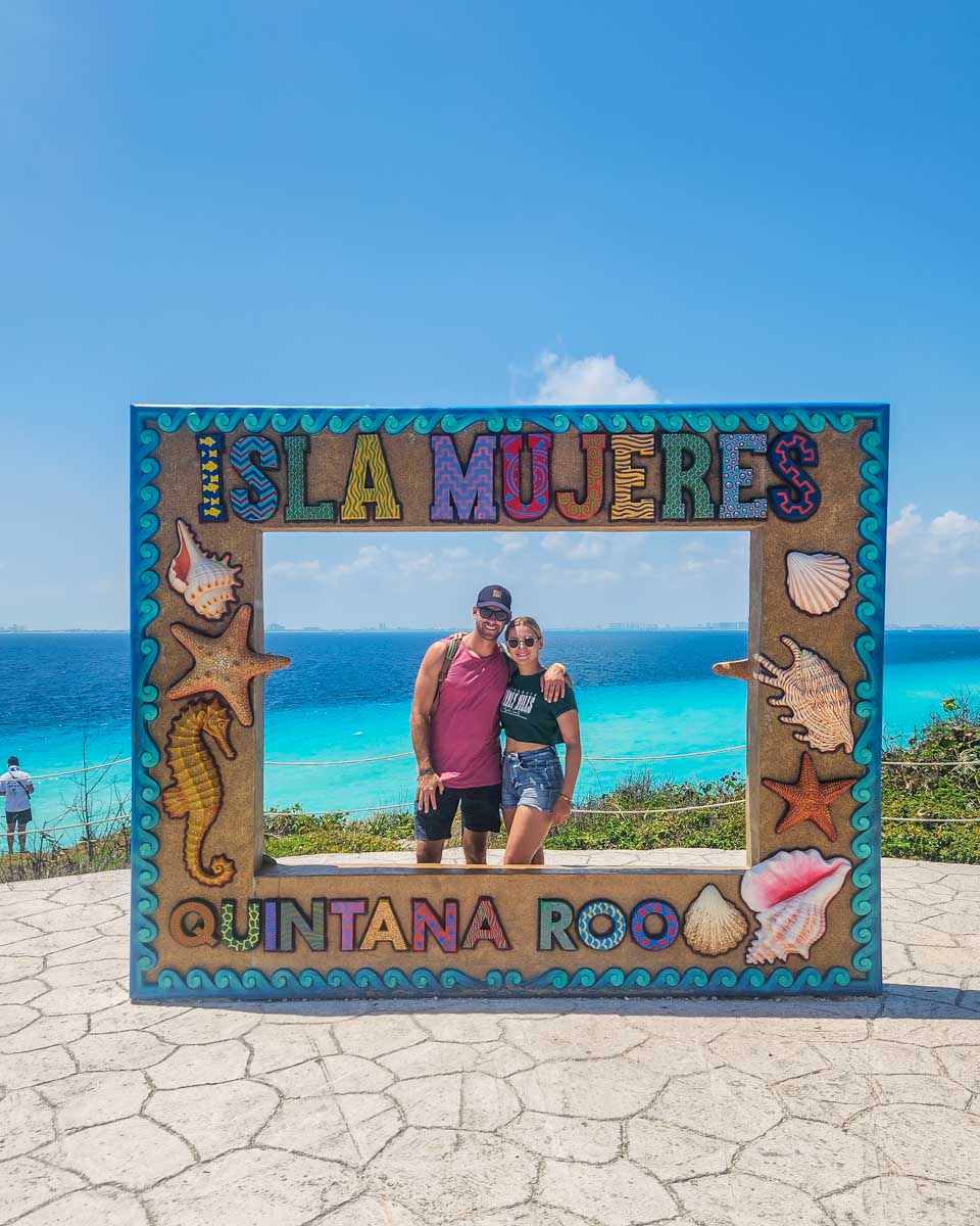 Bailey and Daniel pose for a photo on Punta Sur on Isla Mujeres, Mexico