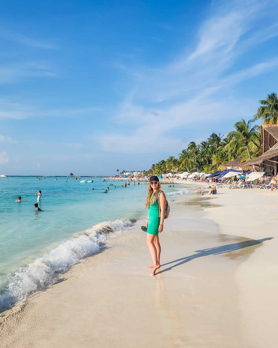 Bailey walks along Playa Norte on Isla Mujeres, Mexico