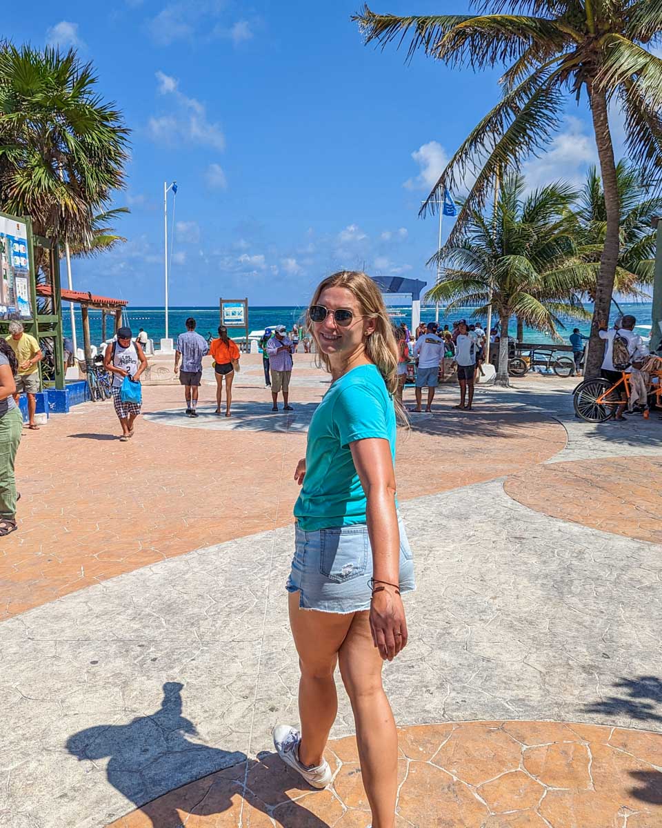 Bailey walks around Puerto Morelos, Mexico towards the coastline