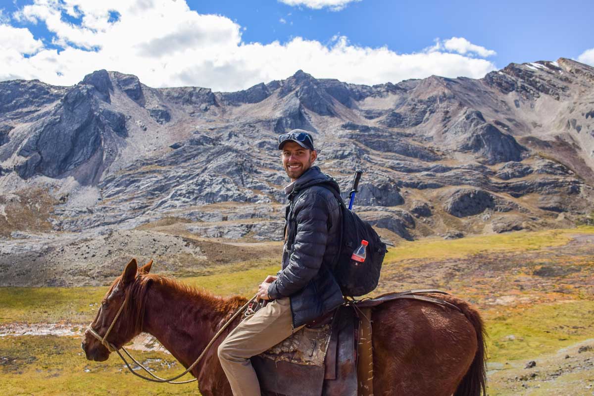 Daniel Horseback riding in the mountains near Cusco on a tour