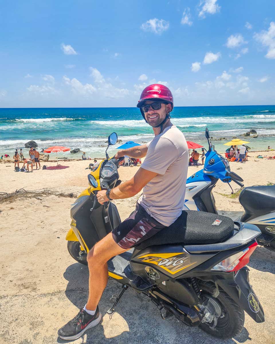 Daniel on his rental scooter as he explores Cozumel, Mexico
