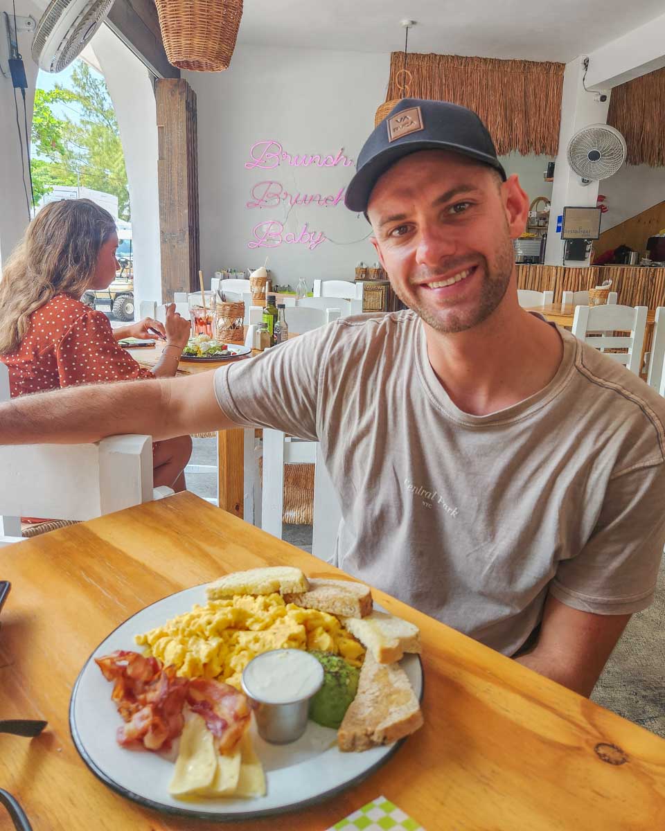 Daniel with his brunch at Oh My Brunch on Isla Mujeres