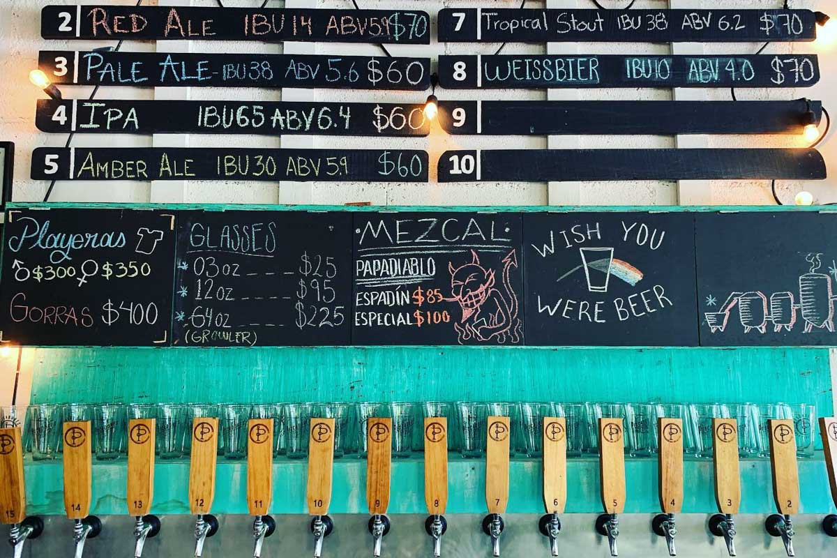 The craft beer taps at Fábrica Casa Cervecera Pescadores