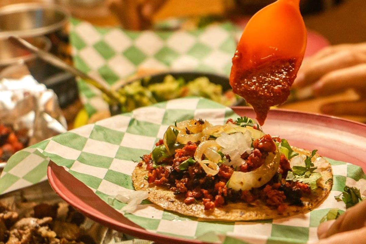 a plate of tacos from Taqueria Los Coapenitos in Cancun, Mexico