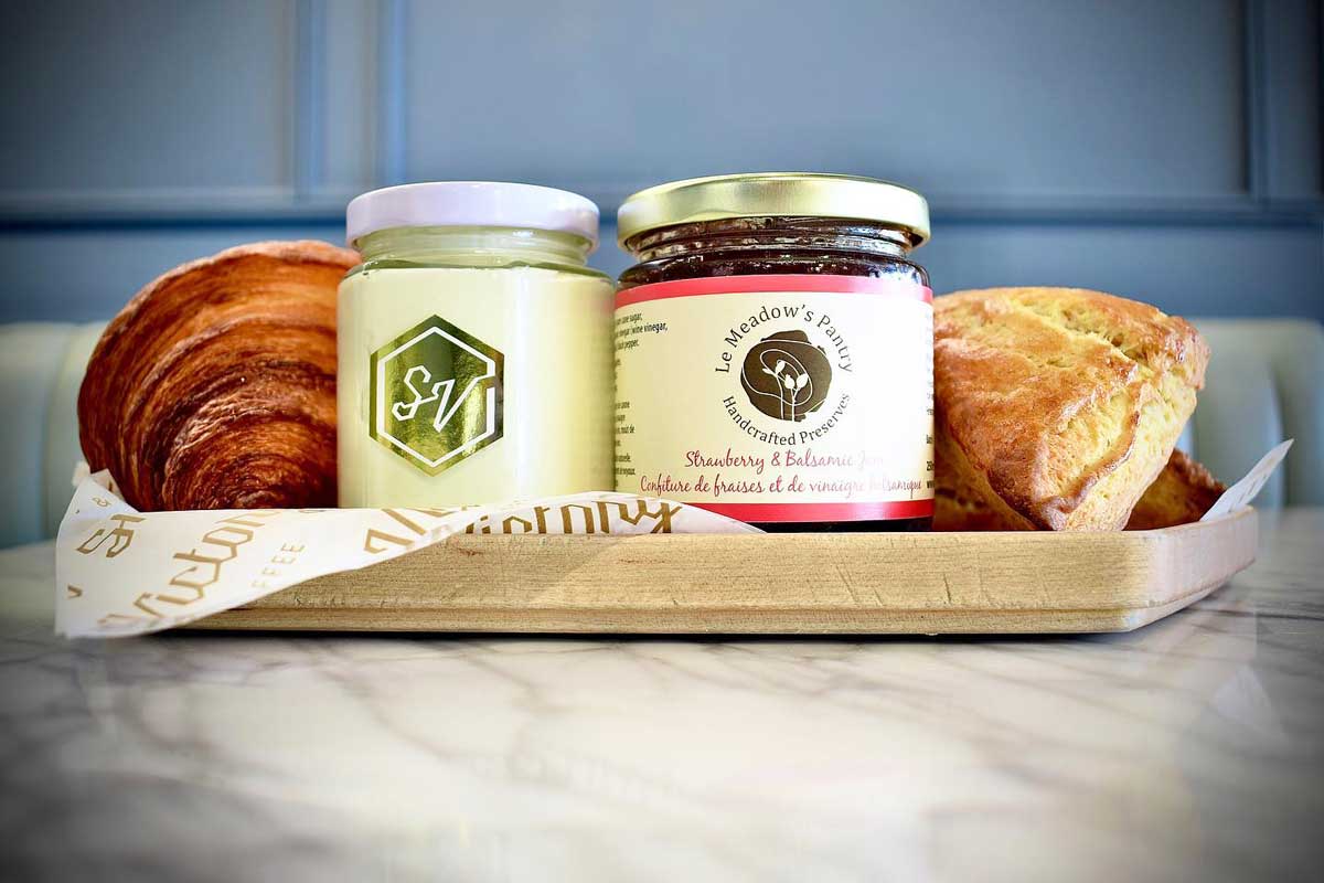 bread and bottled jam at Small Victory Bakery in Yaletown, Vancouver