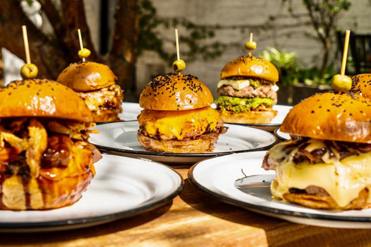 Assorted Burgers at Mu. Burgerhouse Av.40Â in Playa Del Carmen, Mexico