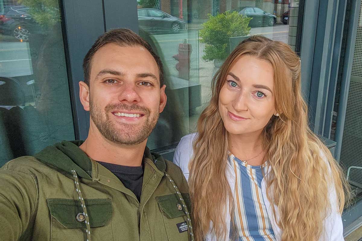 Daniel and Bailey take a selfie at a restaurant in Gastown