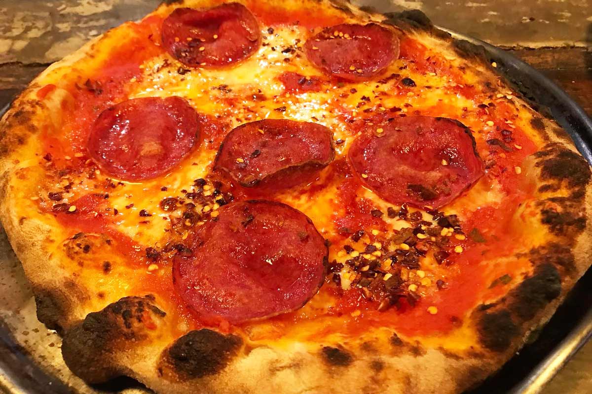 pizza salame from Boccanera Pizzería y Cervecería in Tulum, Mexico