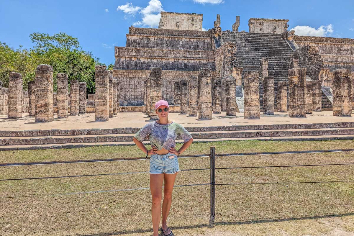 Bailey stands in Front of the The Temple of the Warriors in Chichen Itza, Mexico