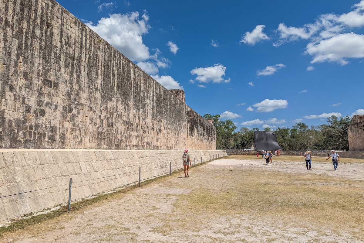 Bailey walks through The Great Ball Court at Chichen Itza, mexico