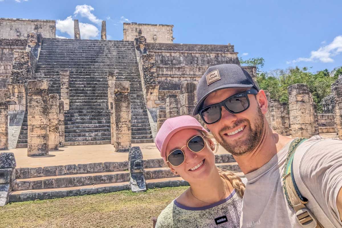 Daniel and Bailey take a selfie in front of the The Temple of the Warriors at Chichen Itza, Mexico