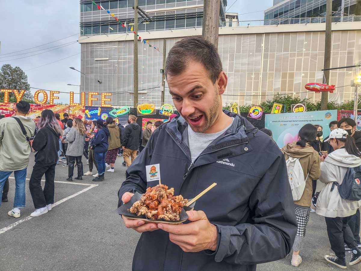 Daniel with his fried squid at the Richmond Night Market