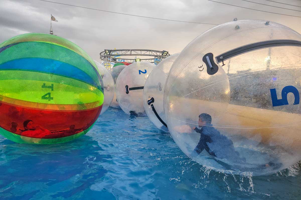 Kids in inflatable balls at the Richmond Night Market, Vancouver