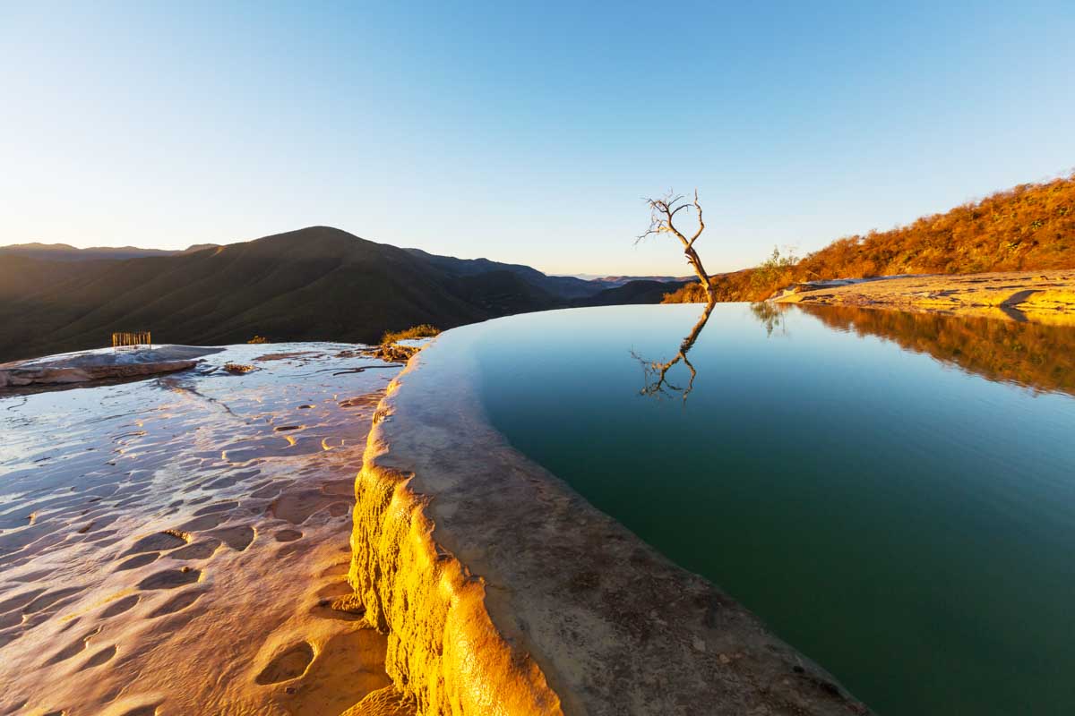 Sunset over a pool at Hierve El Agua, Mexico