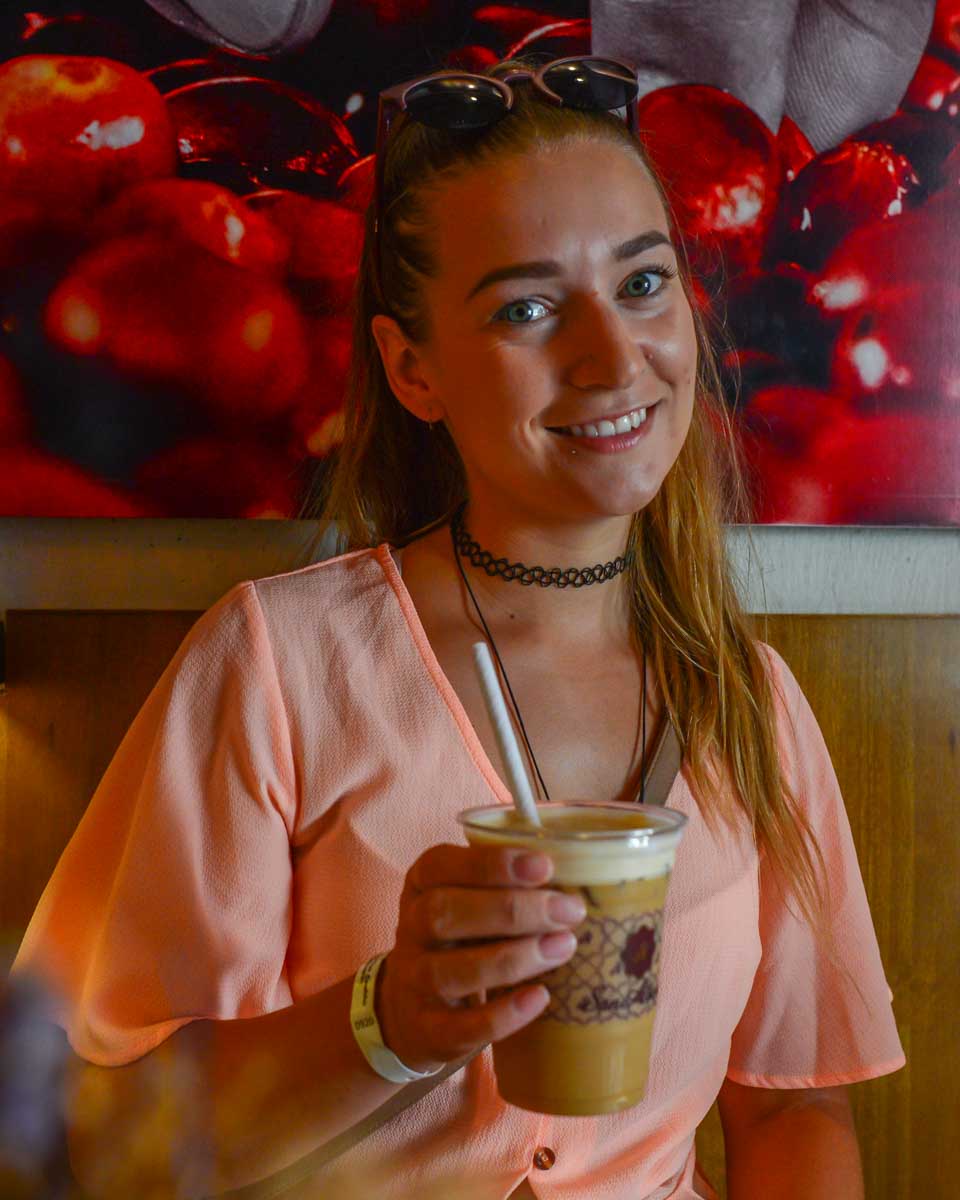 Bailey drinks a coffee at San Alberto in Cartagena, Colombia