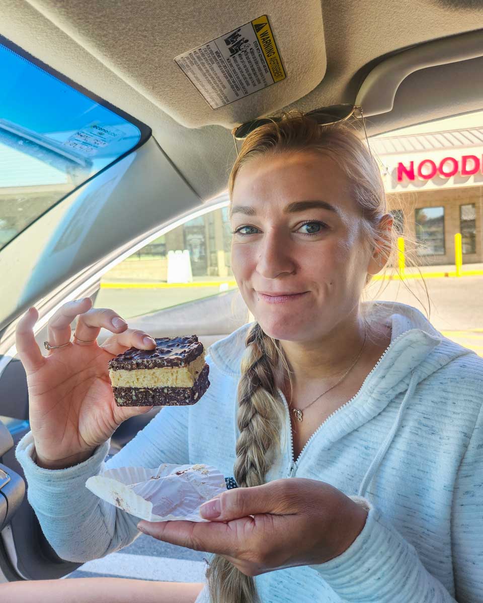 Bailey enjoys a Nanaimo bar in Nanaimo, BC