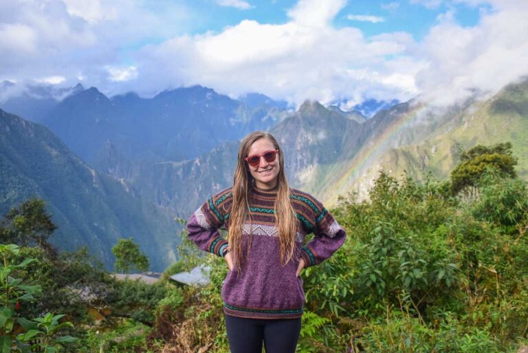 Bailey on the Salkantay Trek with views of Machu Picchu behind her