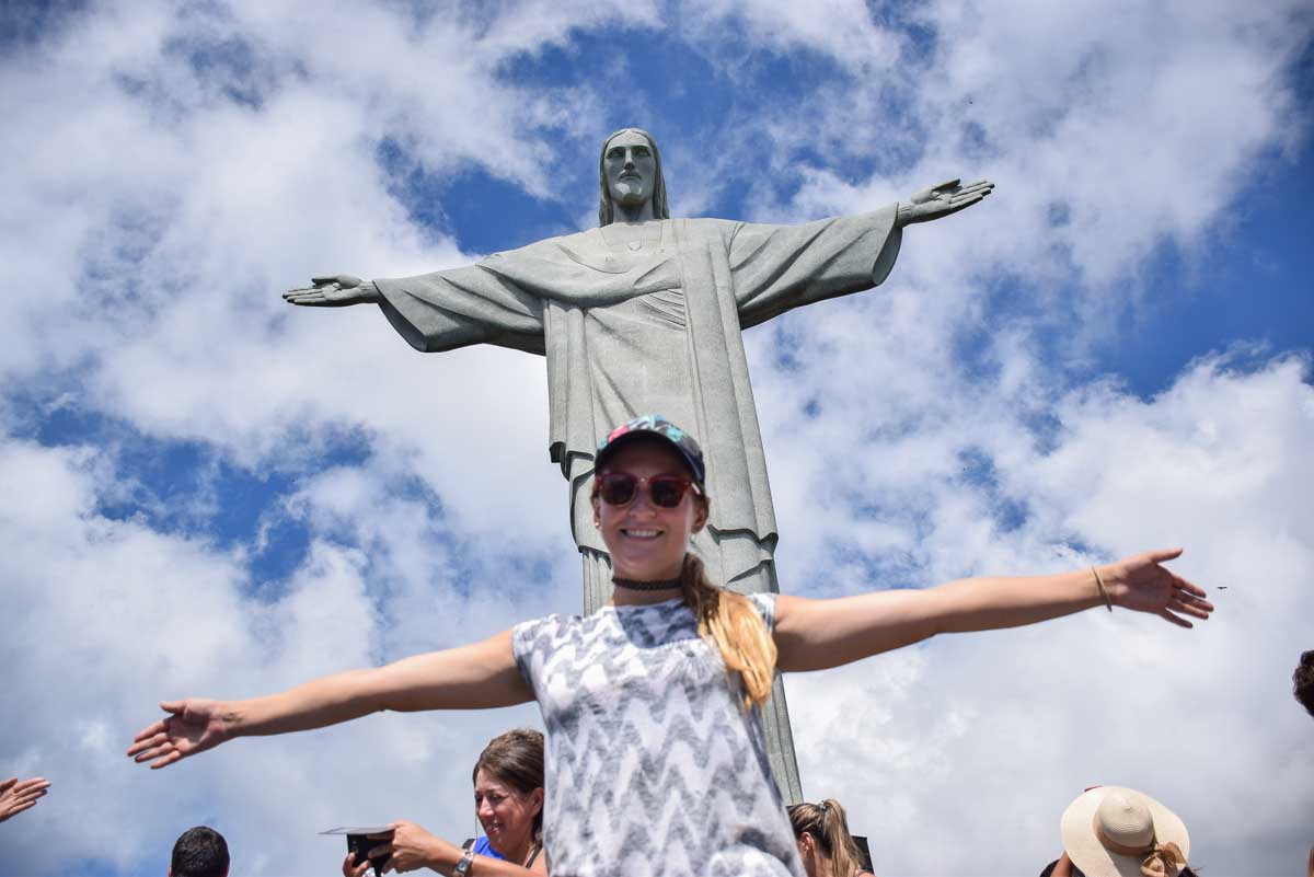 Bailey poses with the Christ the Redeemer Statue in Rio de Janeiro