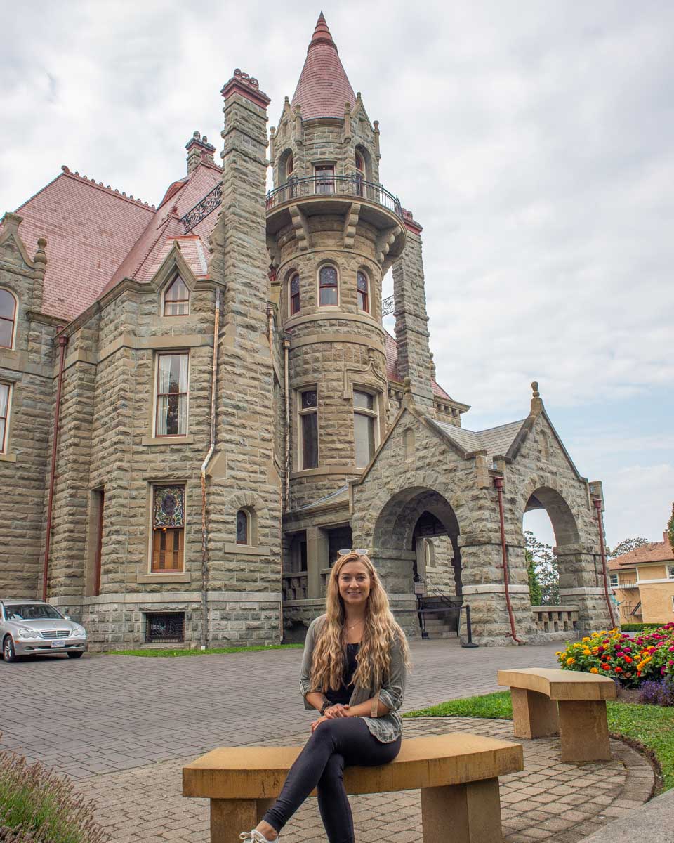 Bailey sits out the front of Craigdarroch Castle in Victoria BC