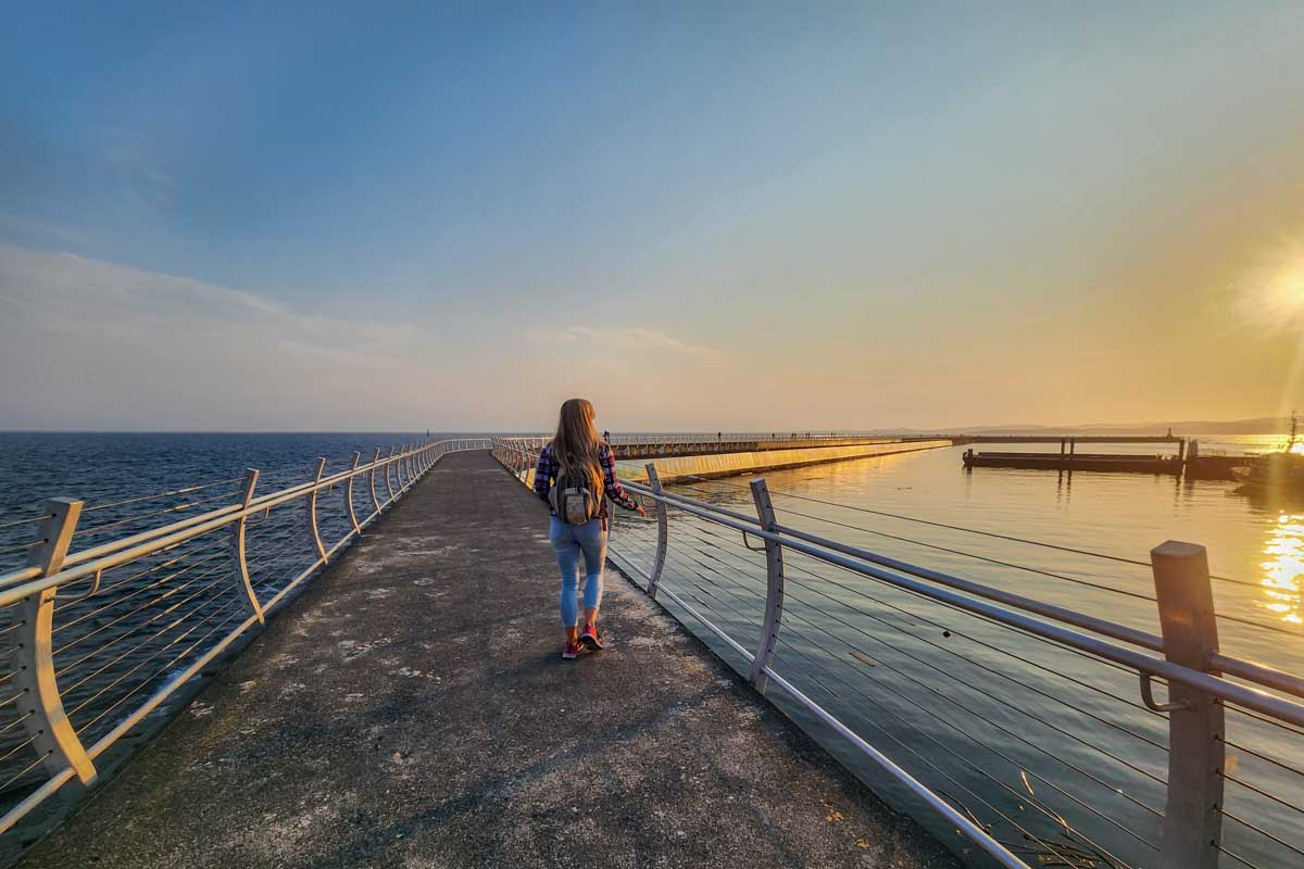 Bailey walks the Breakwater in Victoria BC