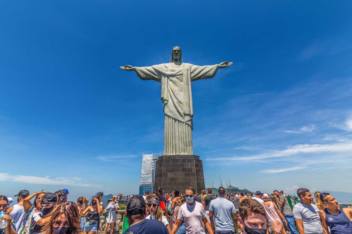 A crowd of people at the Christ the Redeemer in Rio